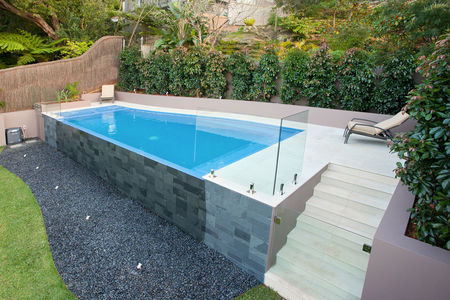 Out of ground pool with infinity edge