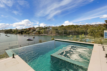 Fully tiled green pool and spa with infinity edge overlooking sydney harbour image 2